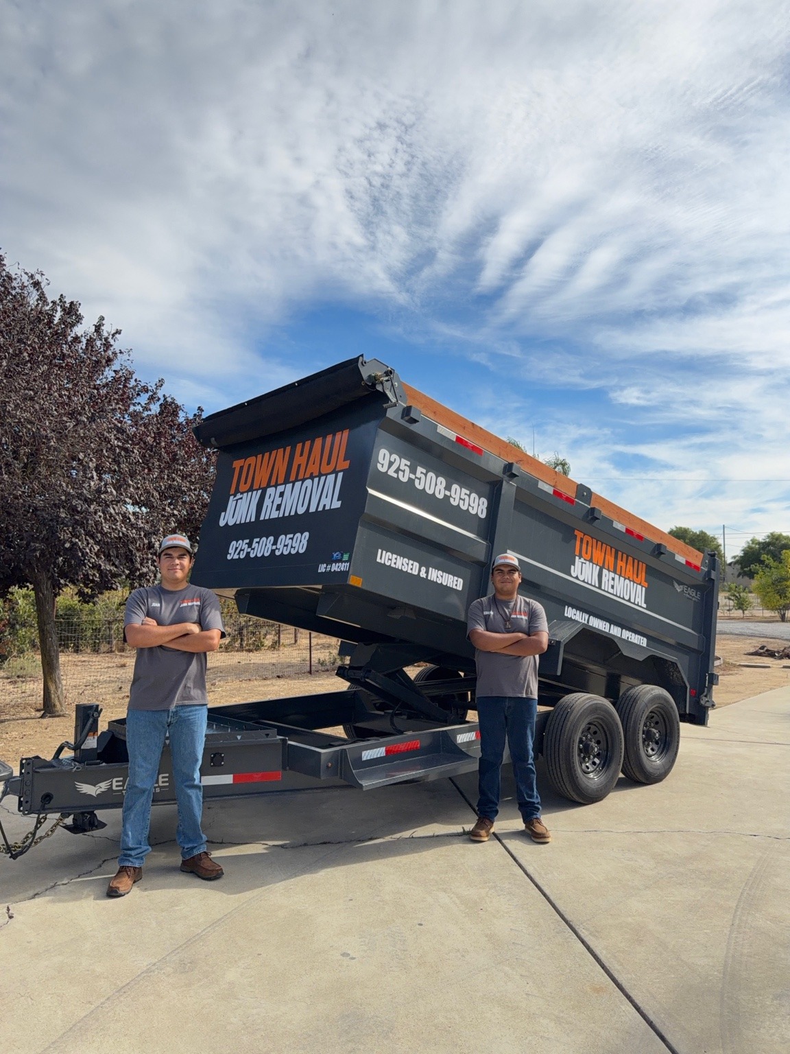 The Town Haul brothers Juan and Sebastian beside their hauling trailer
